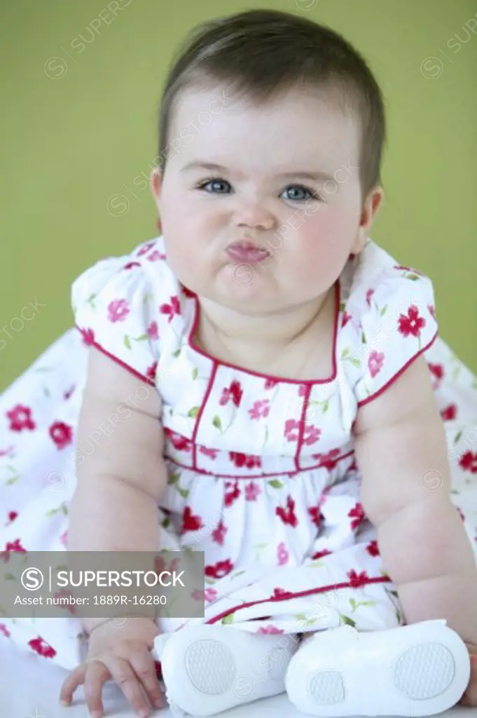 Baby girl with funny face