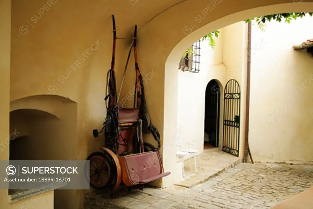 Tuscany, Italy; Horse drawn carriage hanging