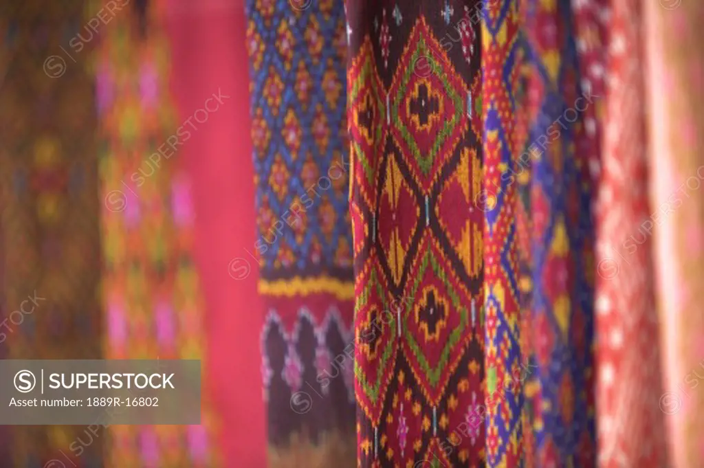 Ban Tha Sawang, Thailand; Colorful silk weaving  