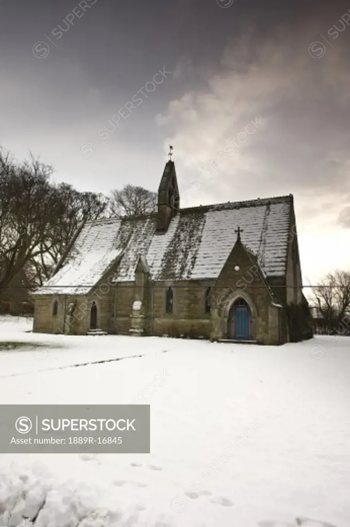 Ford, Northumberland, England; Country church in the snow