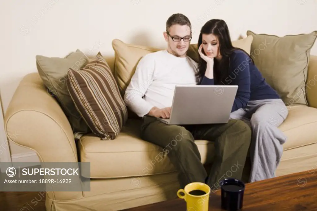 Couple looking at computer