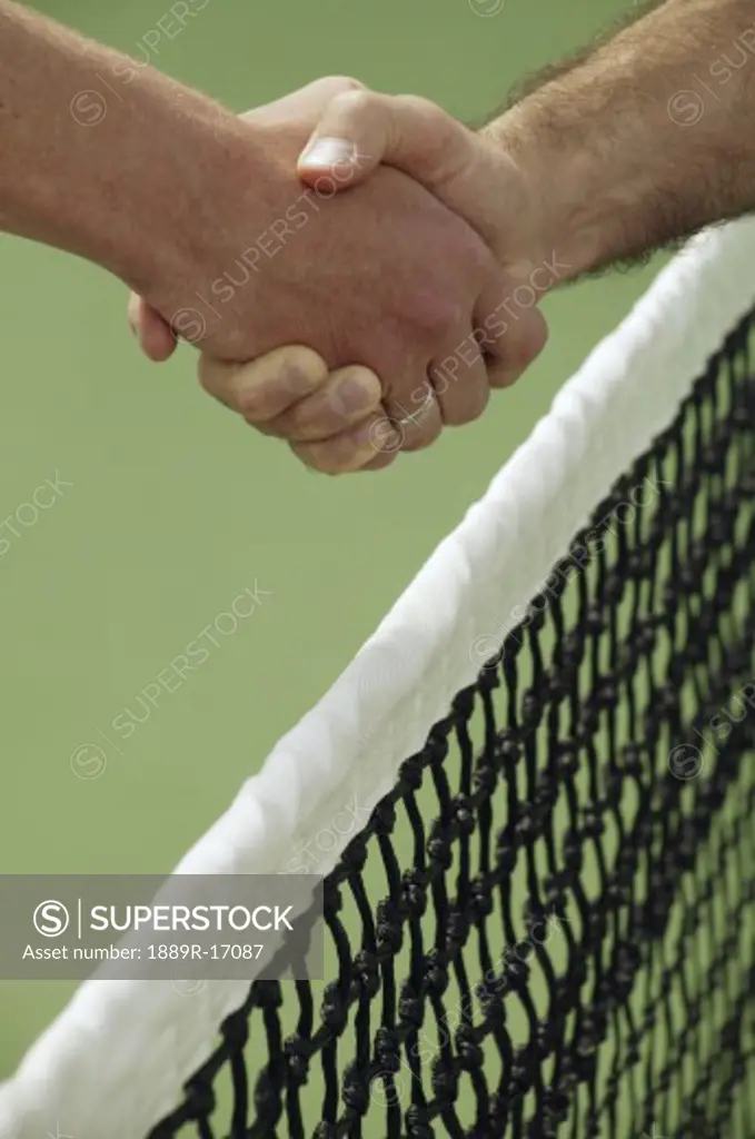 Handshake before a tennis game