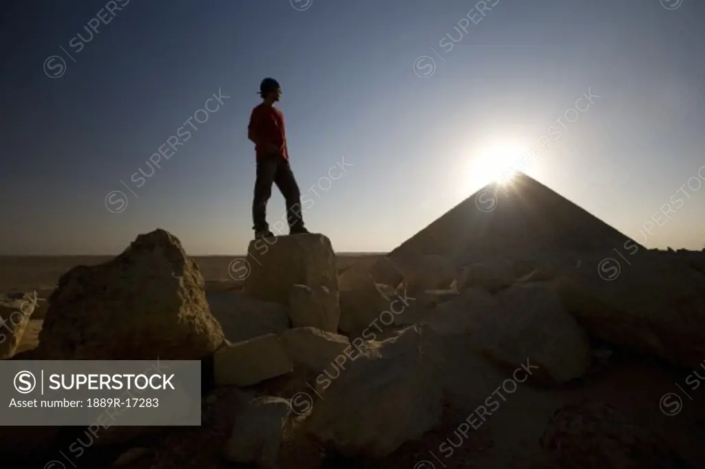 The Red Pyramid, Dahshur necropolis, Egypt; tourist looking at pyramid