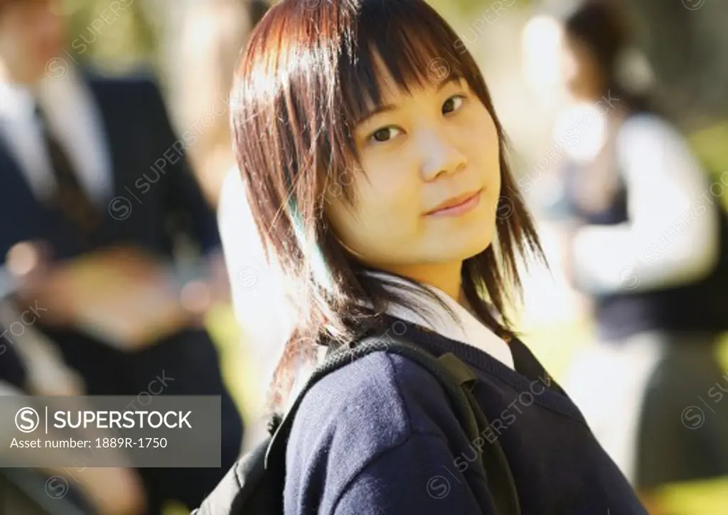Portrait of Asian teenage female student
