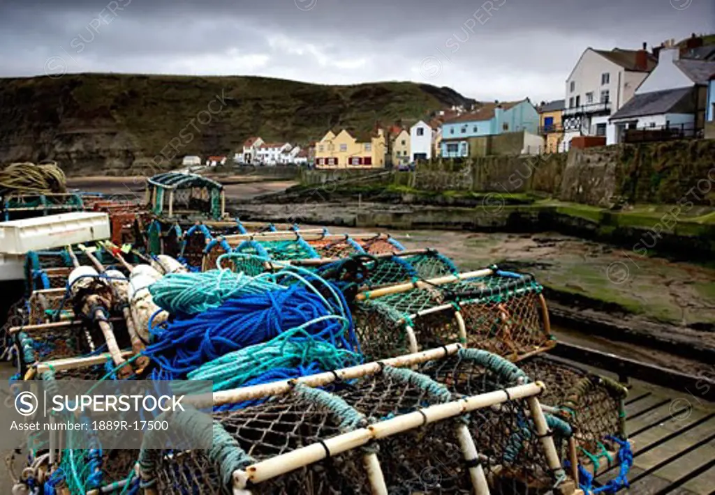 Staithes, Yorkshire, England; Fishing supplies on a dock