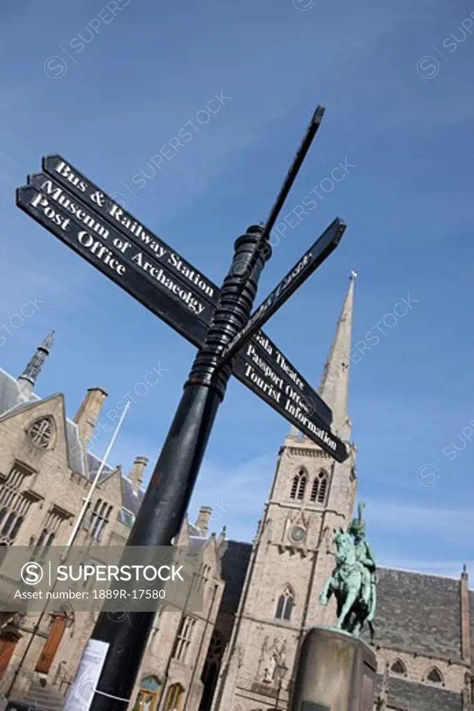 Durham, England; Low angle view of directional signs