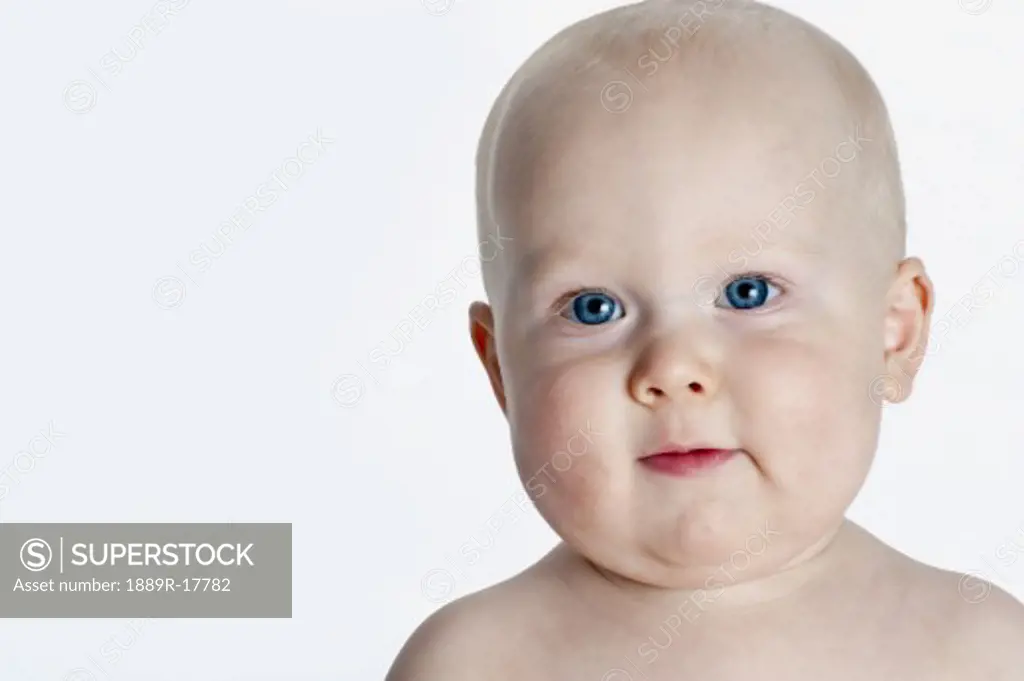 Baby boy; Portrait of baby with blue eyes  