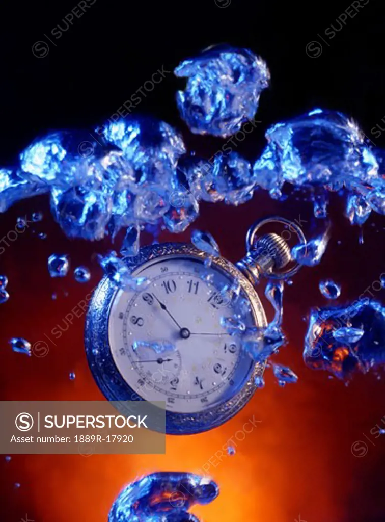 Pocket watch with bubbles and red background