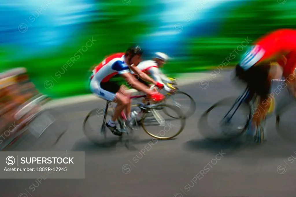 Cyclists racing on road