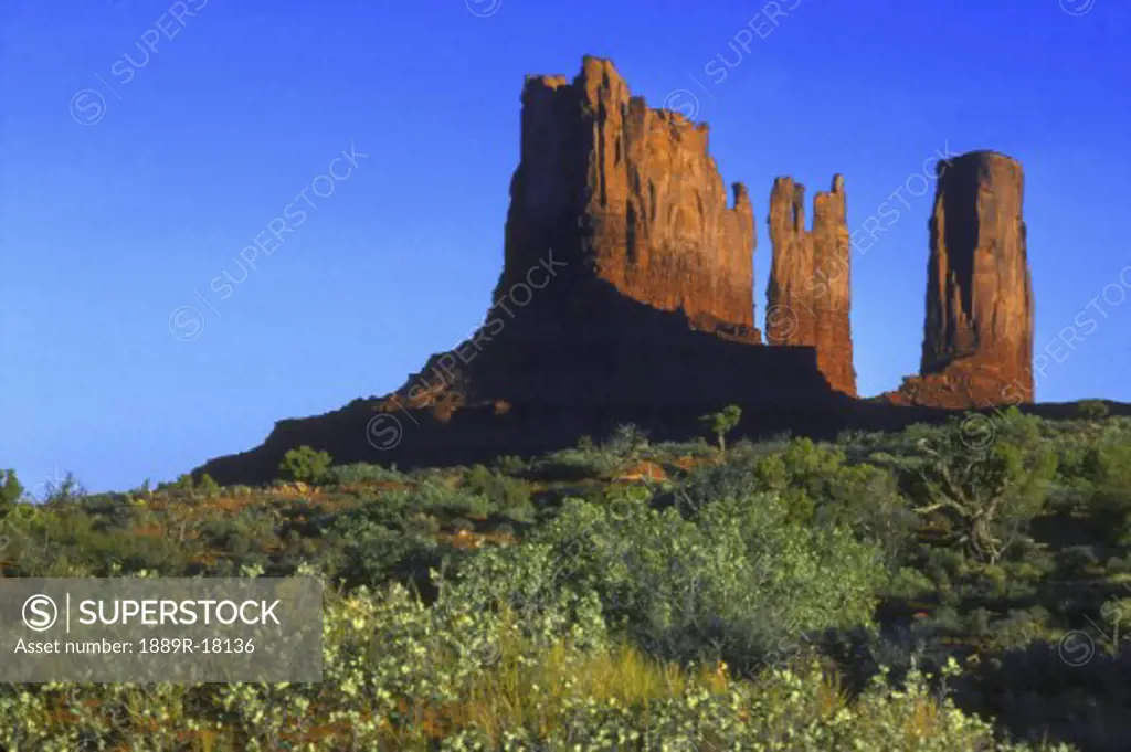 Red rock butte in desert Monument Valley
