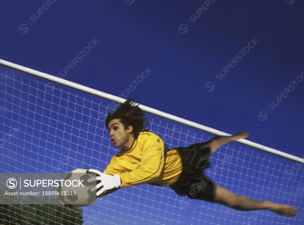 Soccer goalkeeper making a save