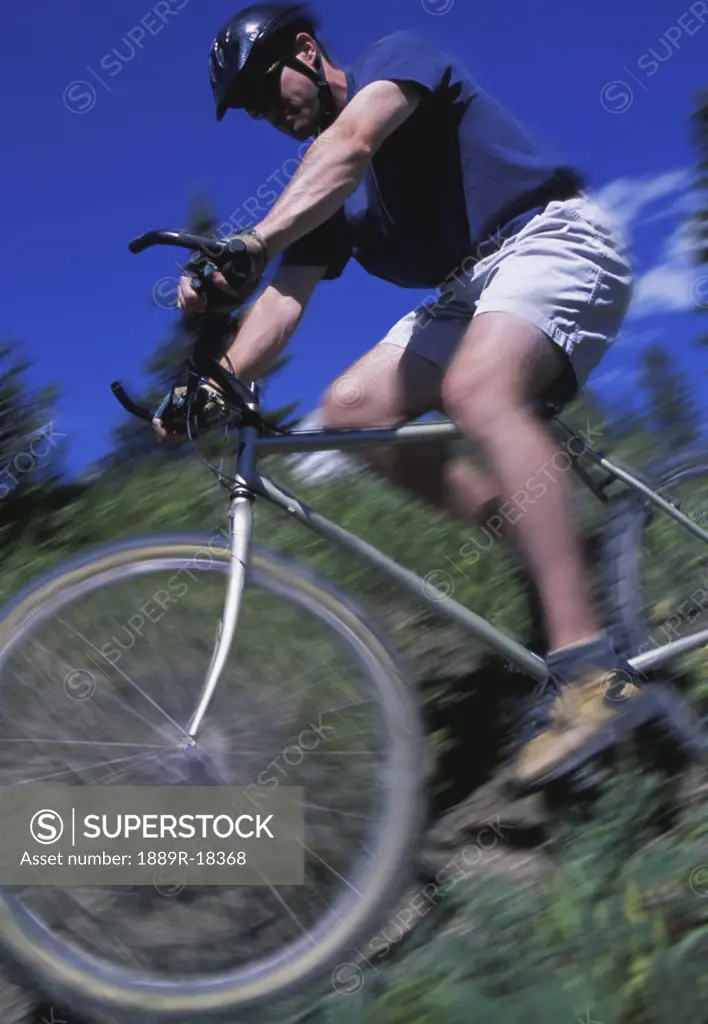 Cyclist going downhill