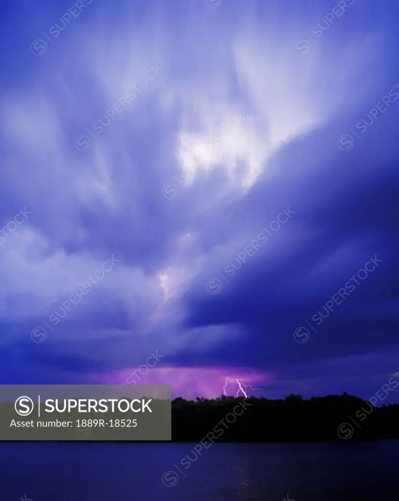 Cloudy sky with lightning in the distance