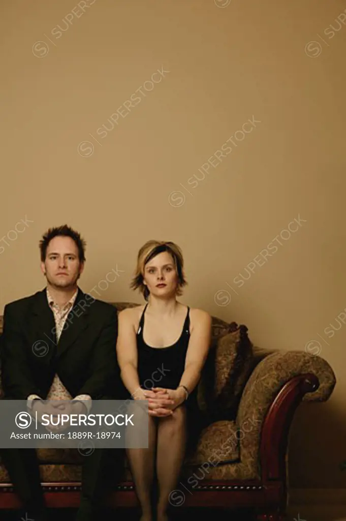Couple sitting side by side