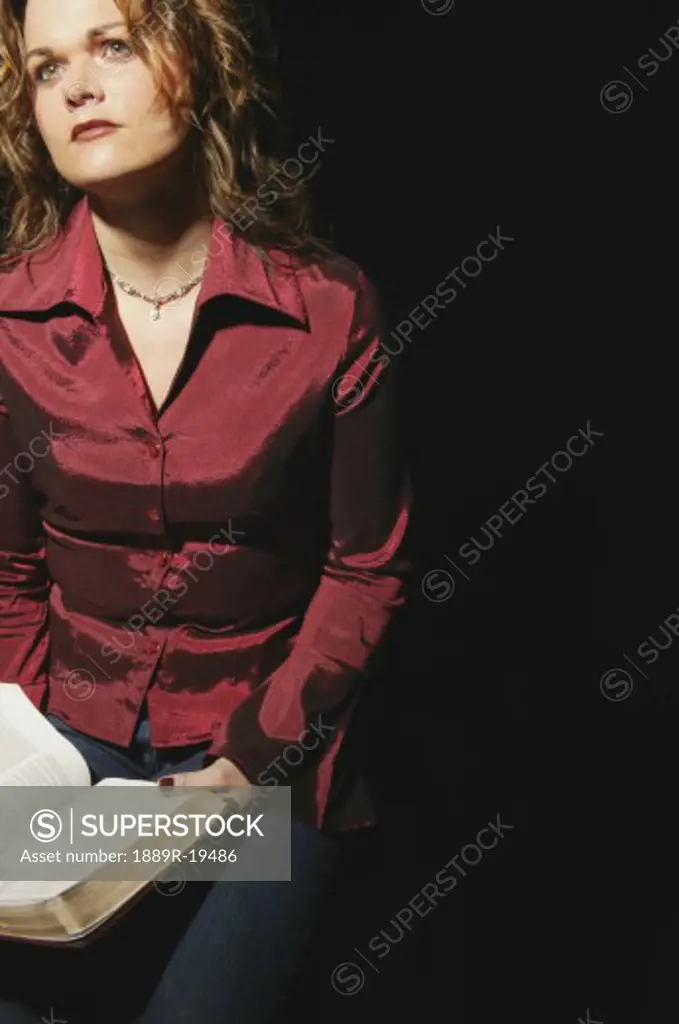Woman holding Bible