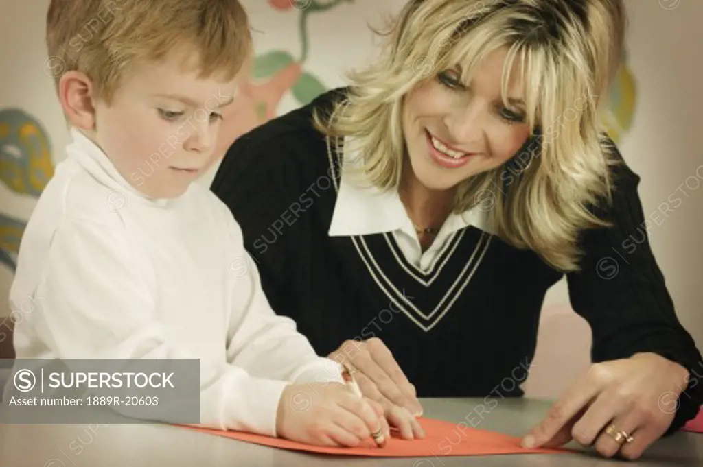 Child makes a coloring