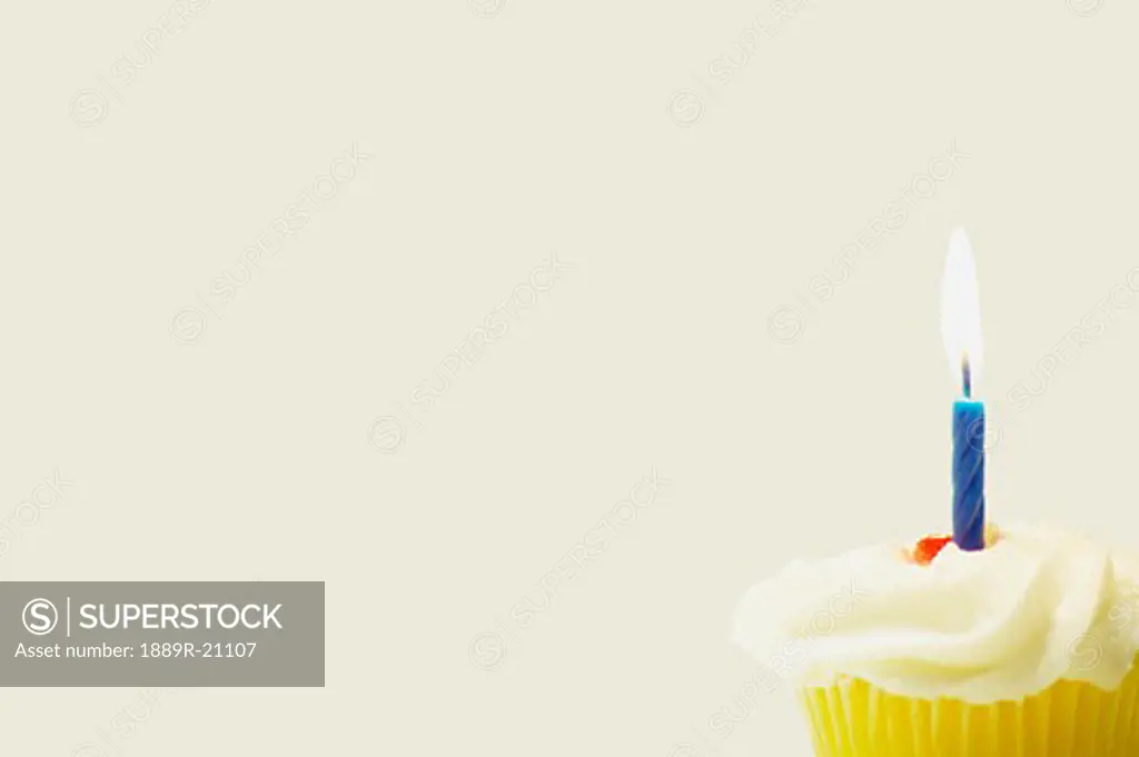 A cupcake with a candle