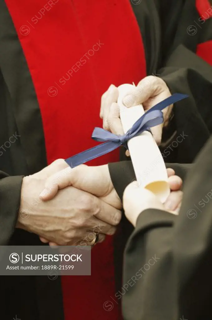 Receiving the diploma