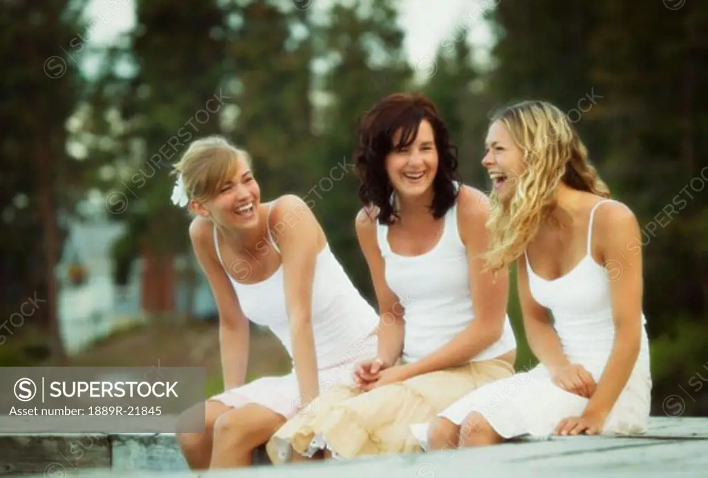 Three woman enjoy a laugh
