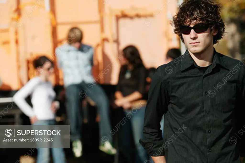 Trendy young man with sunglasses