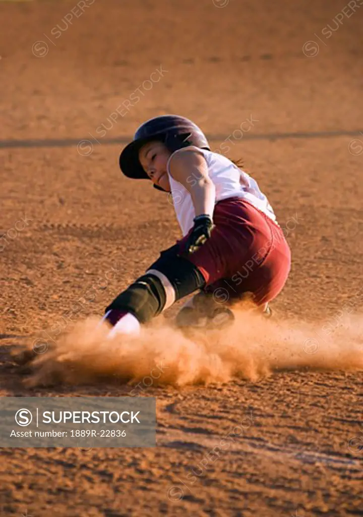 Sliding baseball player