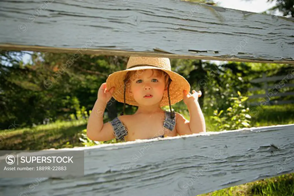 Little boy in straw hat