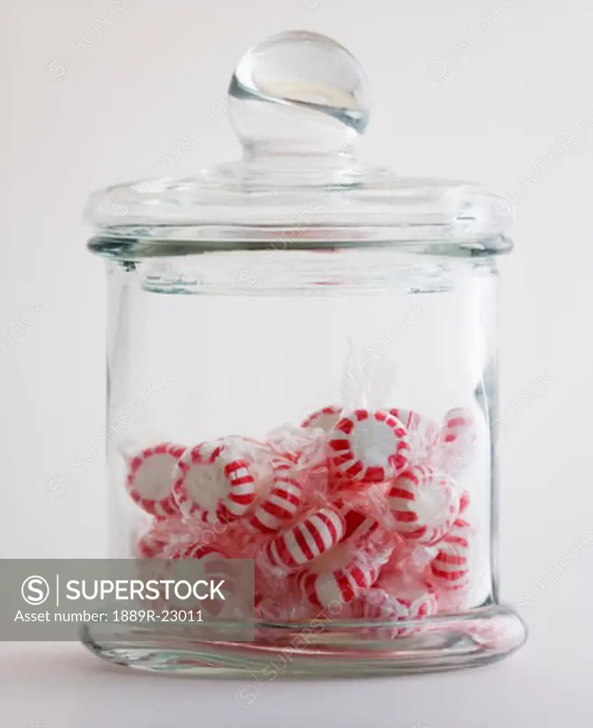 Peppermint candies in glass jar