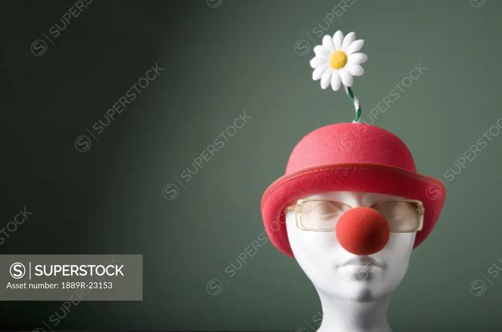 Mannequin with hat and clown nose