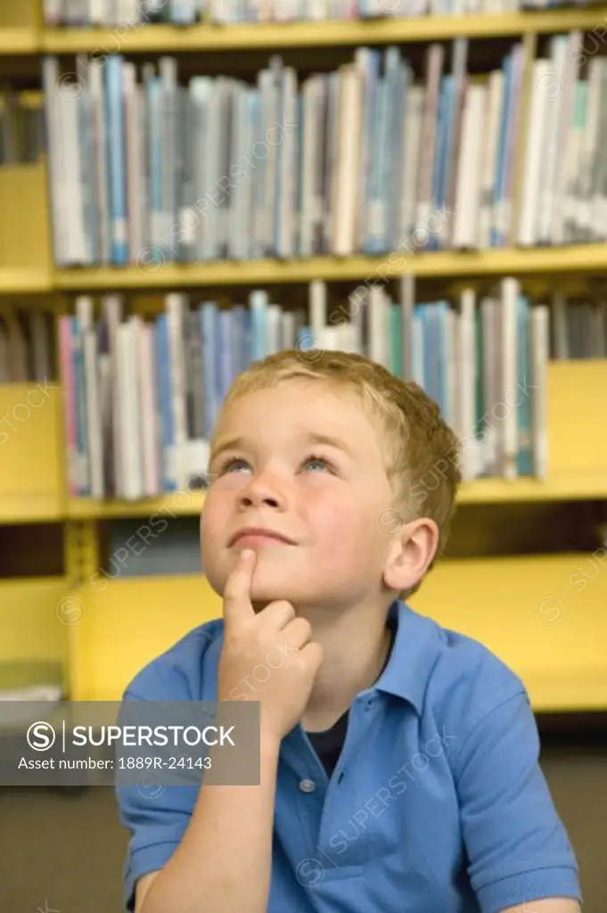 Little boy in library