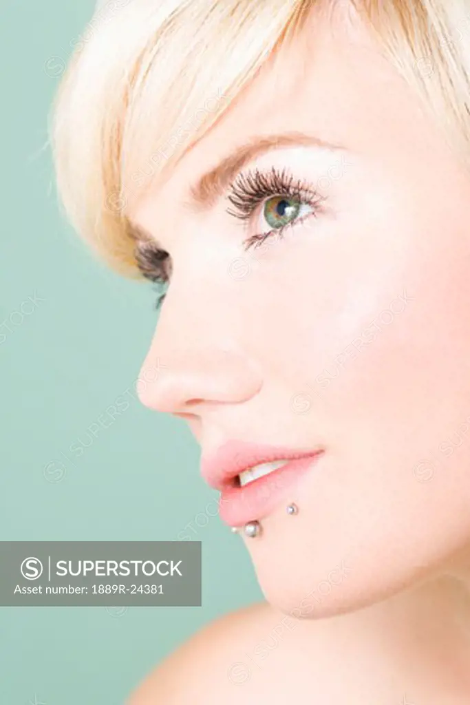 Woman with lip piercings