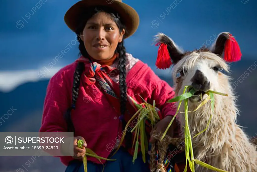 Peruvian woman with a Alpaca