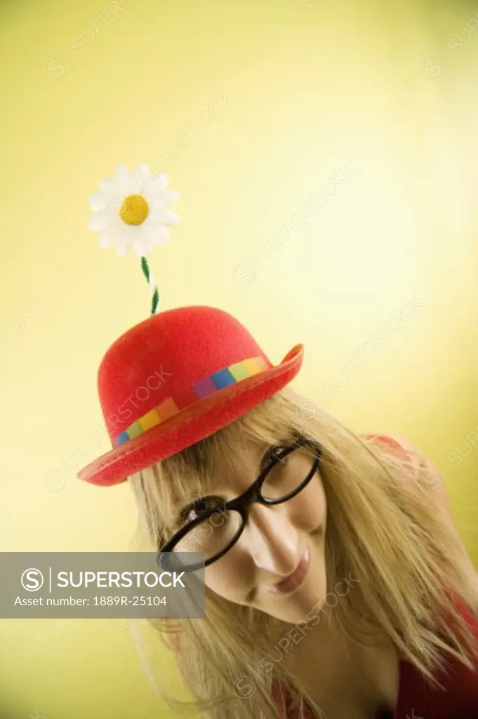 Woman with clown hat
