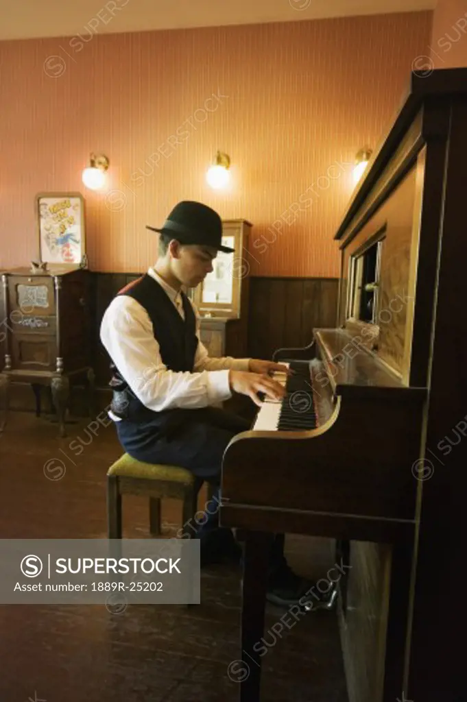 Young man playing piano