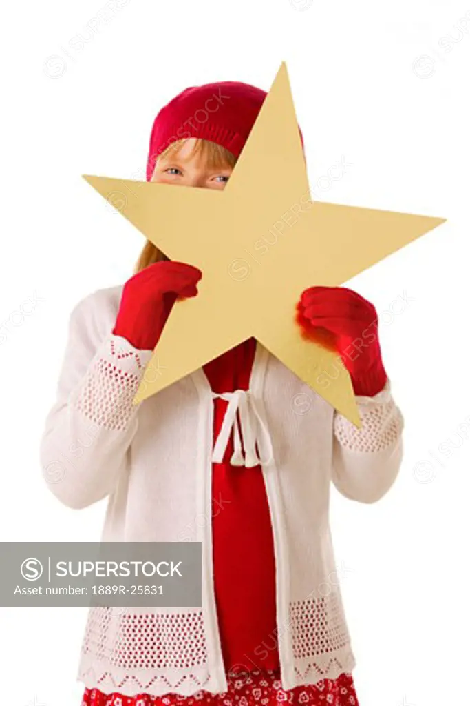 Girl holding a star