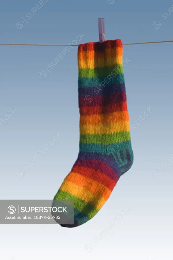 Single striped sock hanging