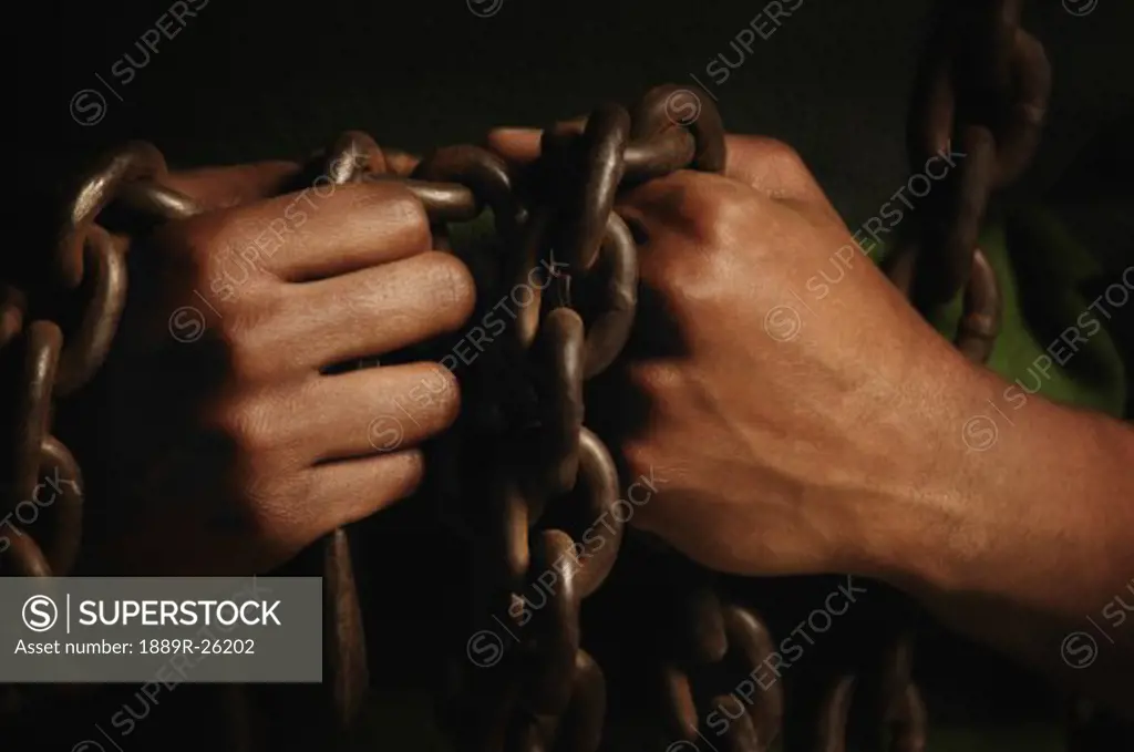 Person bound in chains