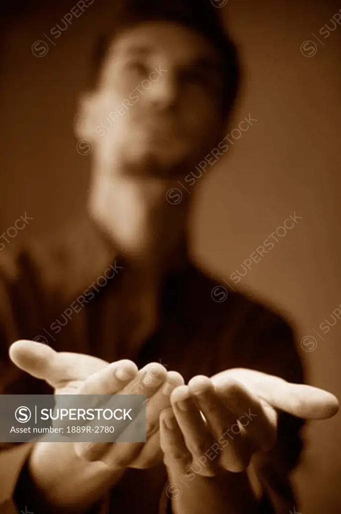 Man waiting with open hands
