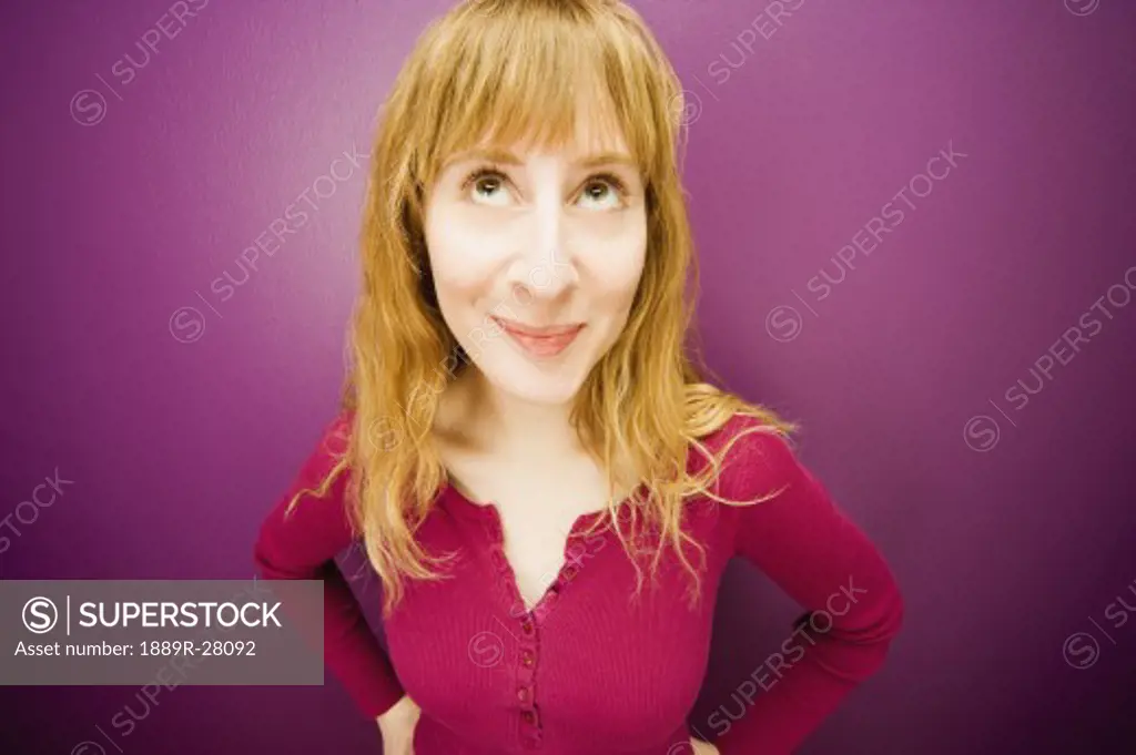 Woman in front of a purple background