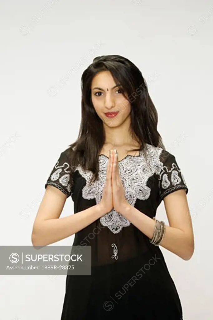 Woman with her hands folded