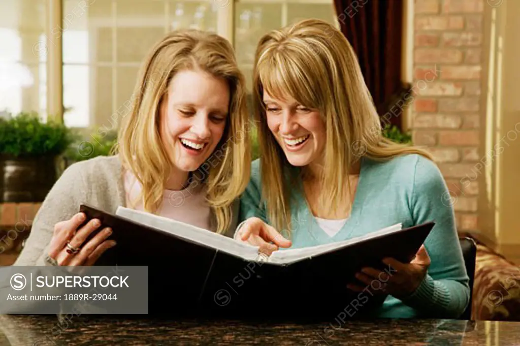 Women looking at a photo album
