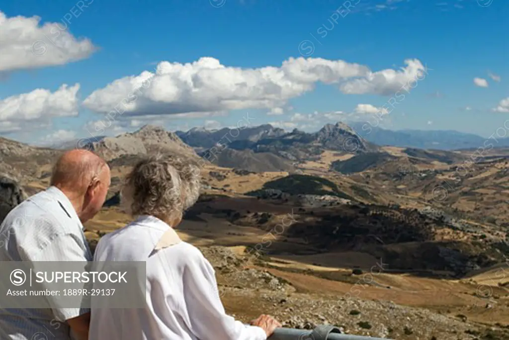 Couple looking out at El Torcal in Antequera, Spain