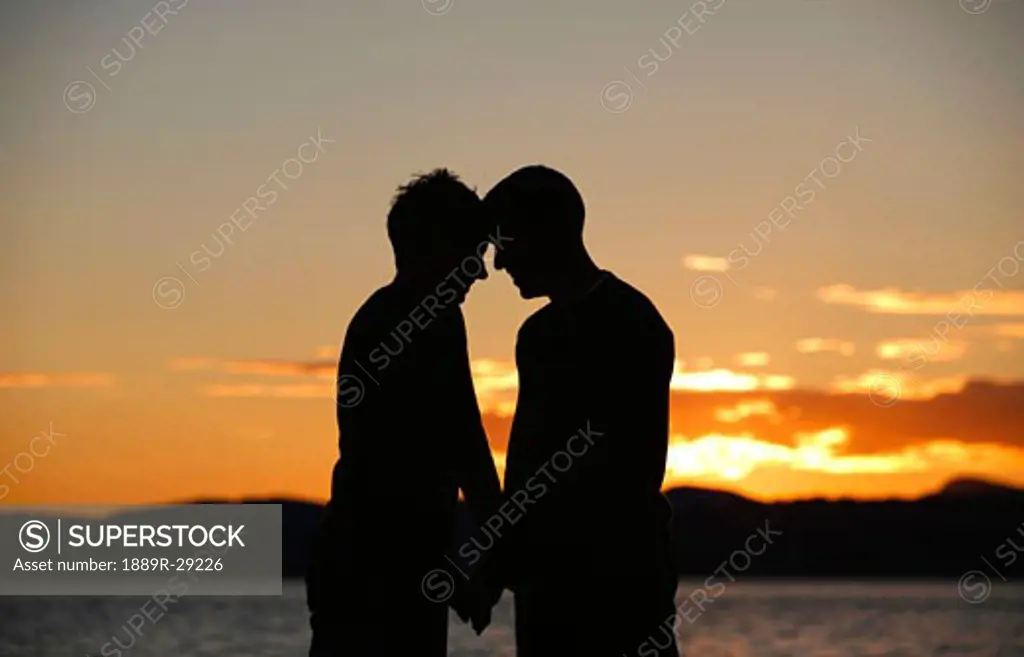 Couple standing by the water