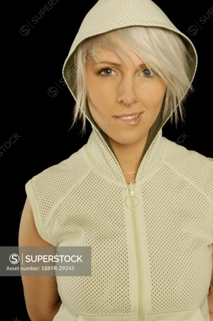 Portrait of a woman wearing a hood