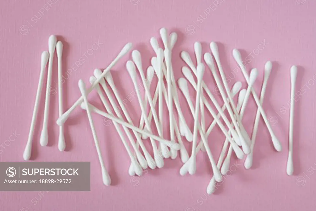 Cotton Swabs On Pink Surface