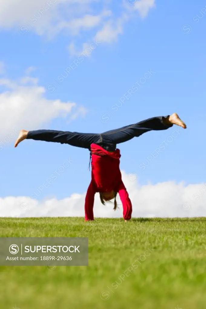 Girl doing a handstand