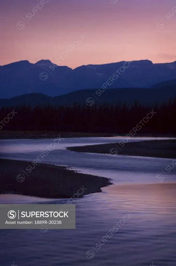 Mountain sunset over Athabasca River  