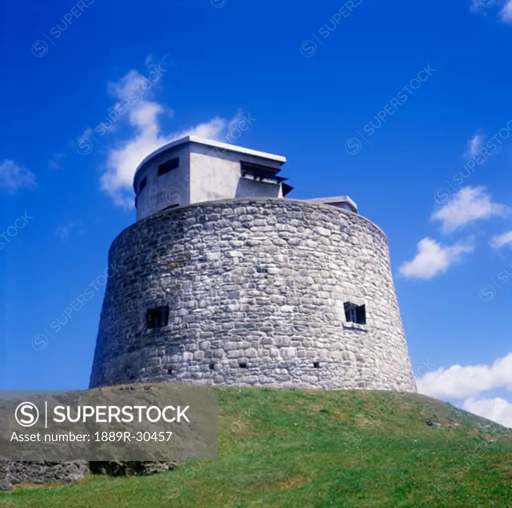 Round stone building on hilltop