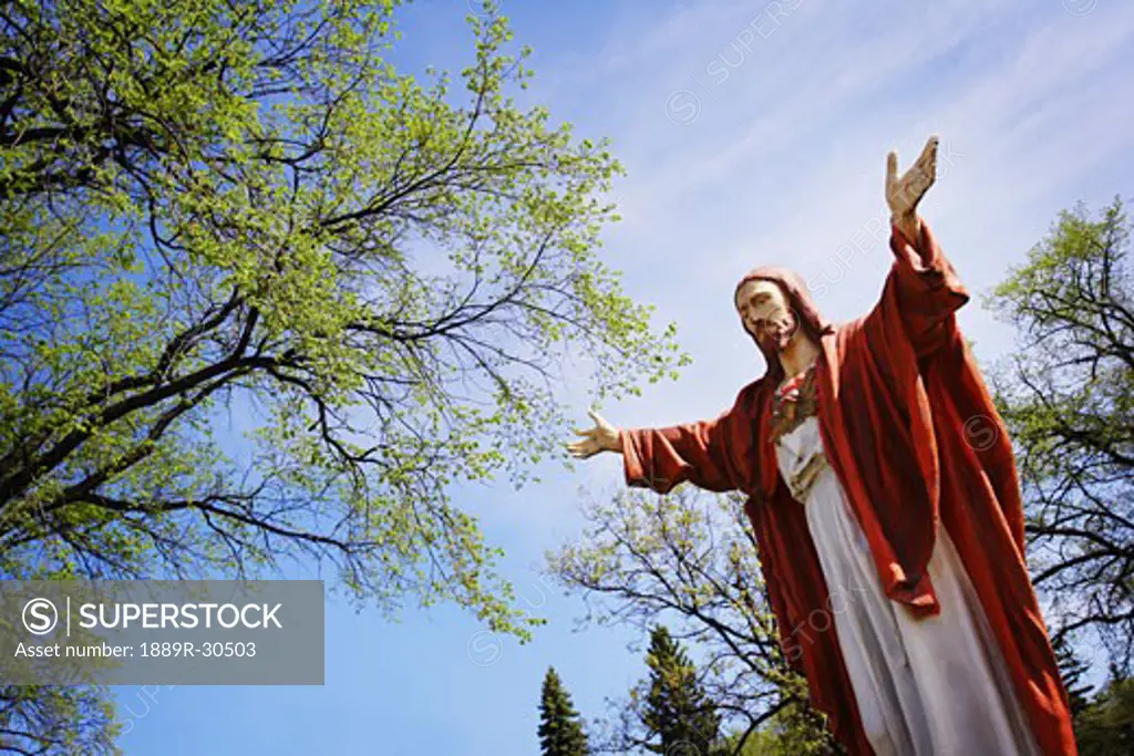 Statue of Jesus with outstretched arms