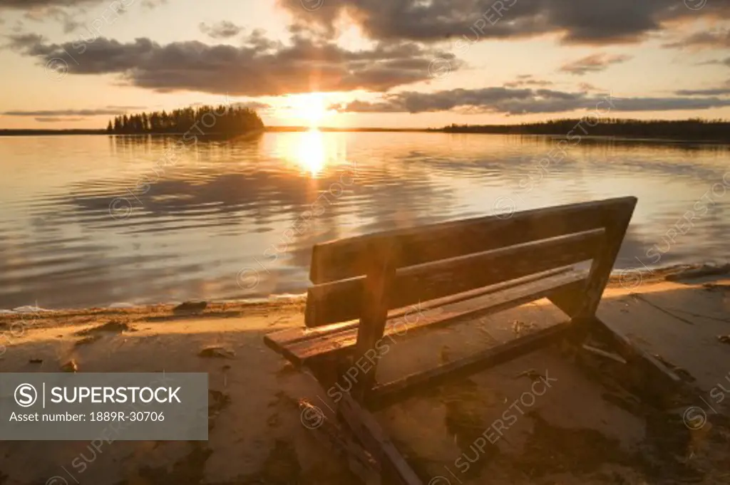 A bench overlooking Astotin Lake at Elk Island National Park, Alberta, Canada  