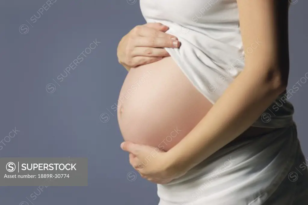 Side view of a pregnant woman